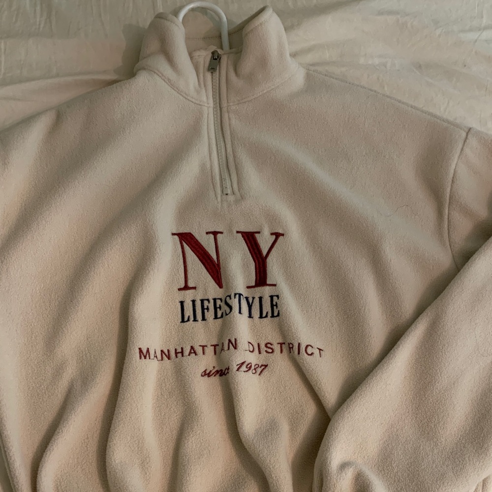 Graphic quarter zip sweater